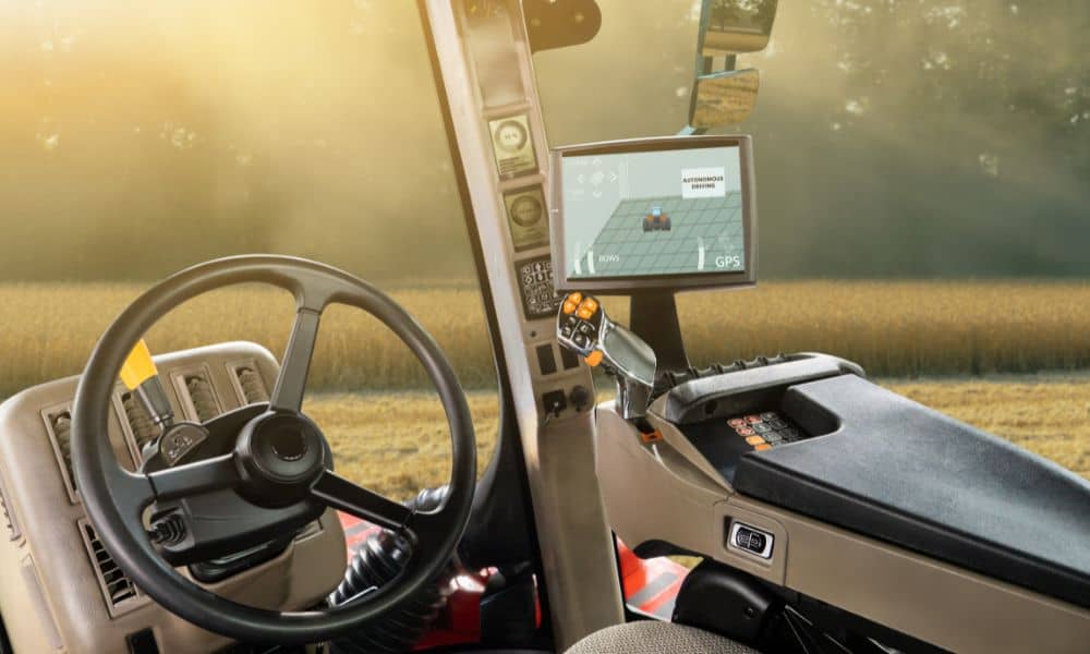 GPS-guided construction equipment showing automated controls inside a modern construction vehicle
