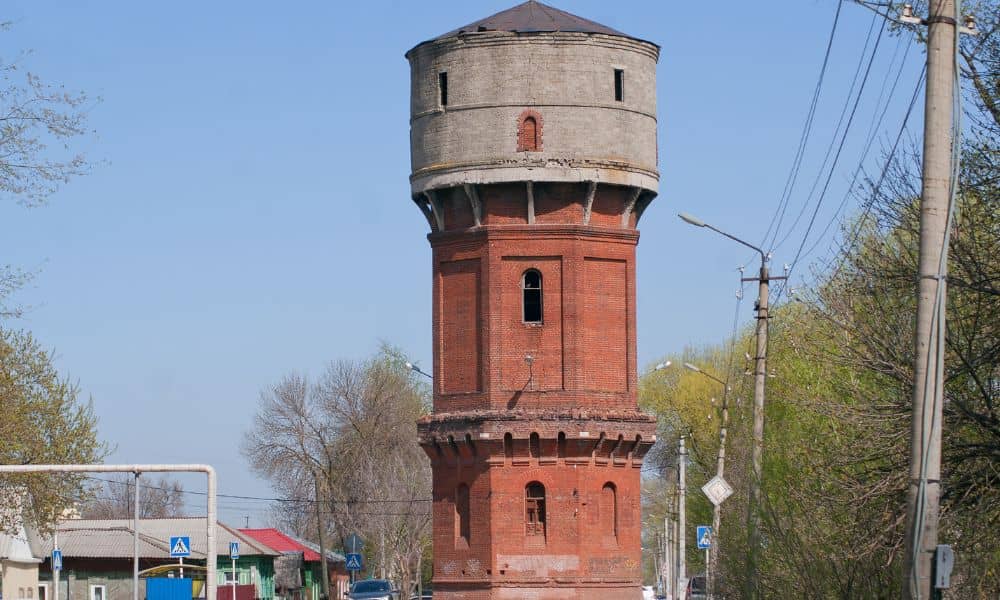 Historic elevated municipal water storage tank serving as a downtown infrastructure landmark